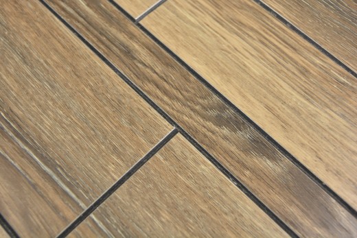 panneaux muraux autocollants aspect bois brun dosseret de cuisine carrelage